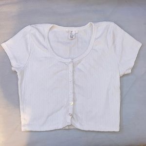 Cute, simple staple piece. Tiny blouse only worn twice.